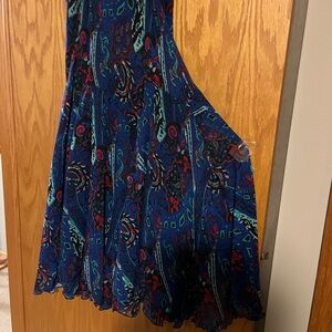 Newsworthy, black lined maxi-skirt with slightly ruffled hem.